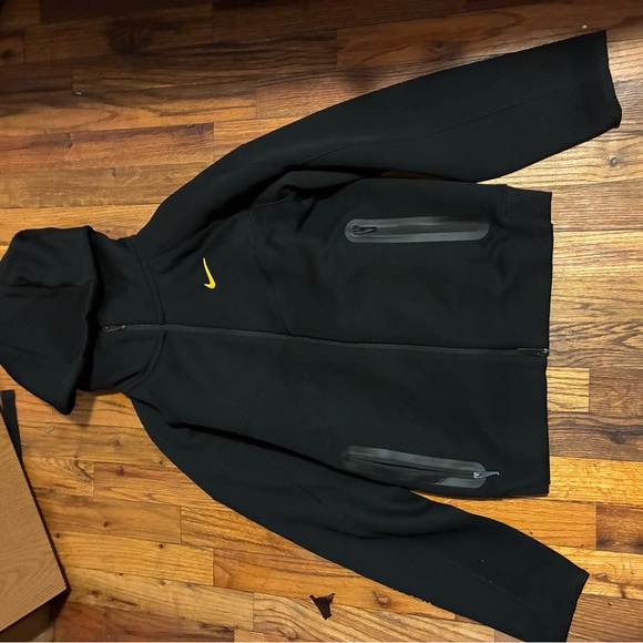 Nike Men's Black Performance Jacket with Yellow Logo